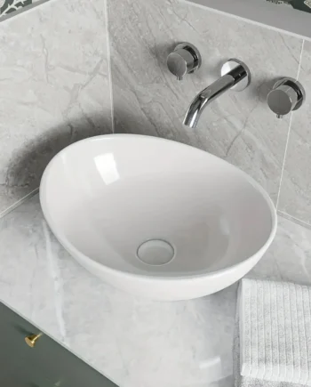 White Oval Ceramic Bathroom Sink – Seamless Egg-Shaped Vanity Basin for Above-Counter Installation