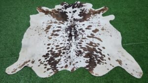 White Cowhide Rug with Brown Speckles