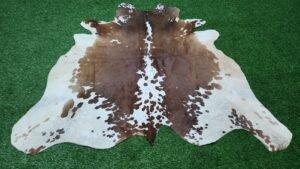 Brown and White Cowhide Rug