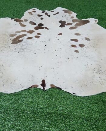 white brown cowhide rug