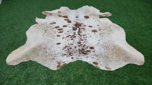 white brown cowhide rug