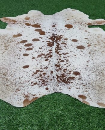 white brown cowhide rug