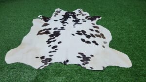 White black brown cowhide rug