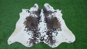 white cowhide rug