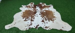Brown white cowhide rug