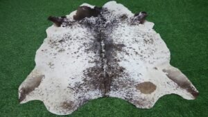 Brown white cowhide rug