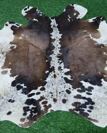 Brown black white cowhide rug