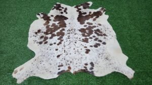 Brown white cowhide rug