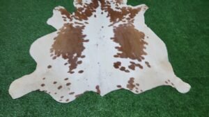 Brown patch cowhide rug