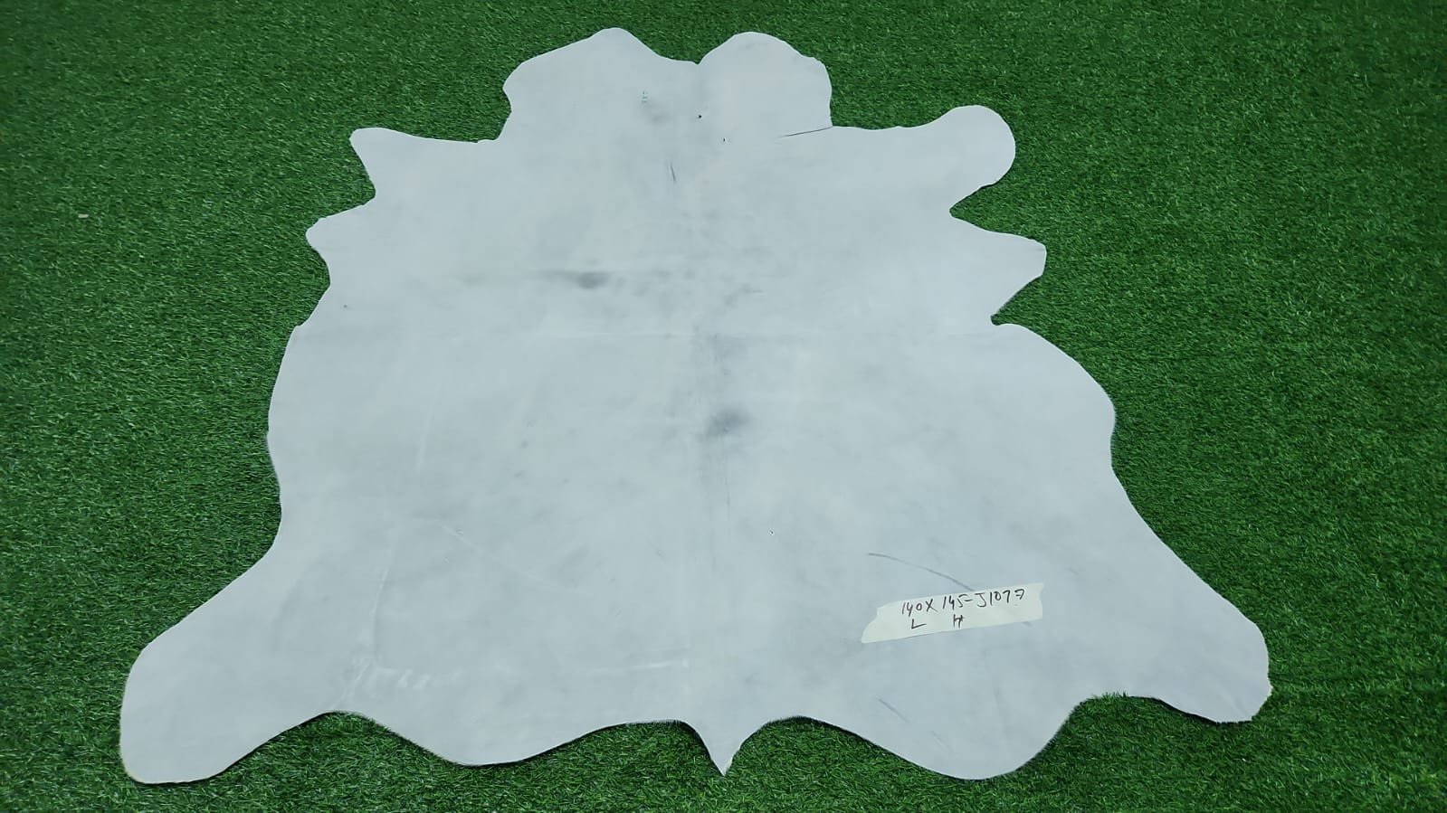 Natural Brown & White Cowhide Rug with White Center Stripe | 140×155 cm