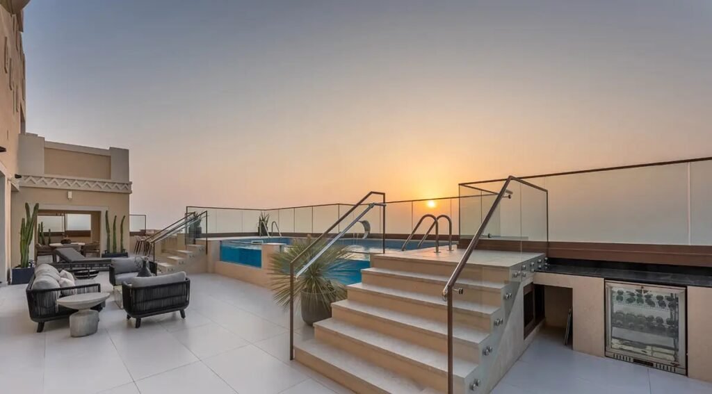 The rooftop terrace was transformed into a luxurious outdoor retreat featuring a premium infinity-style swimming pool
