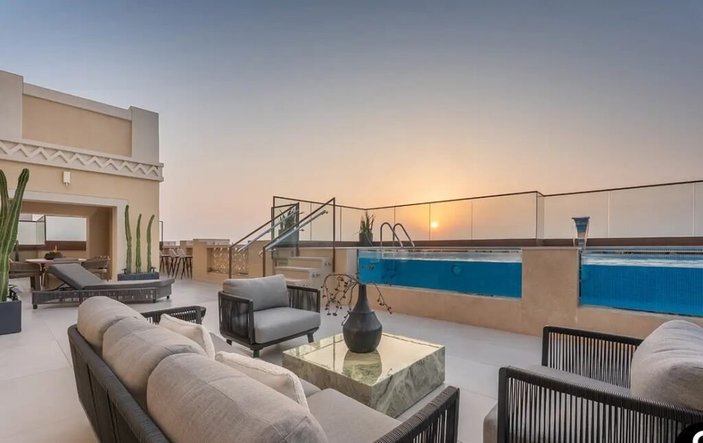 Luxury rooftop pool and outdoor lounge area at Palm Jumeirah penthouse Dubai