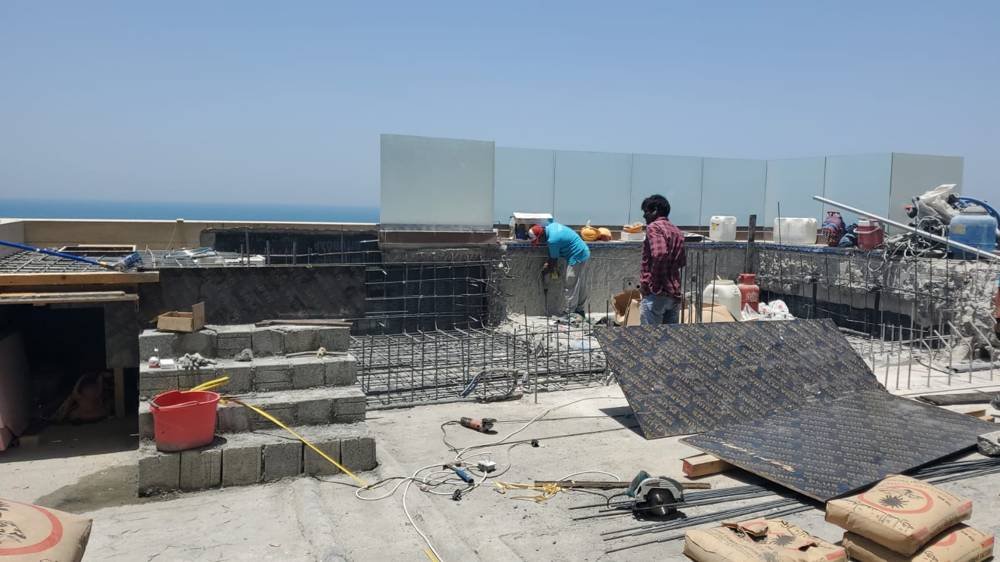 Luxury rooftop swimming pool demolition and structural renovation works at Palm Jumeirah penthouse Dubai